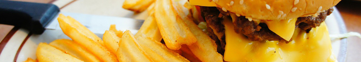 Eating Burger at Surfside Burger Shack restaurant in Eureka, CA.